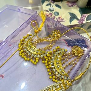 Gold and yellow earring with beads